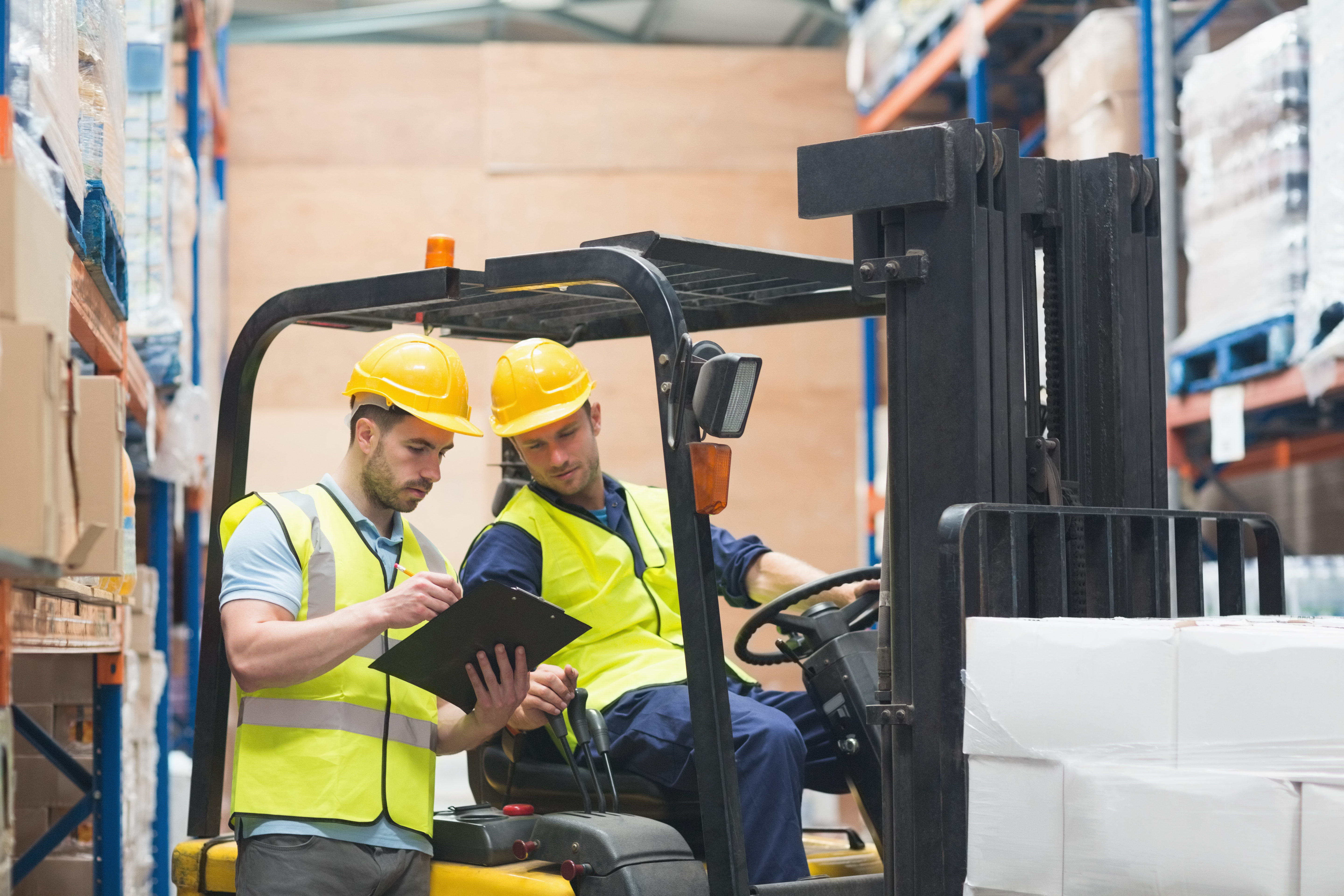forklift instructor driving assessment with operator